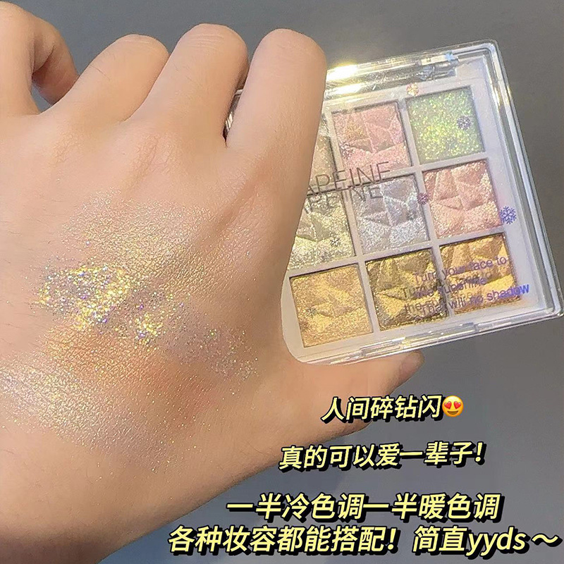 La paleta de sombras de ojos de nueve colores Capel Snowflake brilla y brilla, ilumina y ilumina el gusano de seda acostado, hielo y nieve, diamante, maquillaje transfronterizo