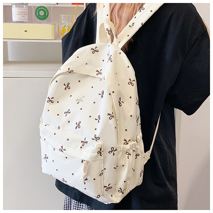 Japanese-style minimalist casual large-capacity backpack for middle and high school students, lightweight and trendy school daypack for girls