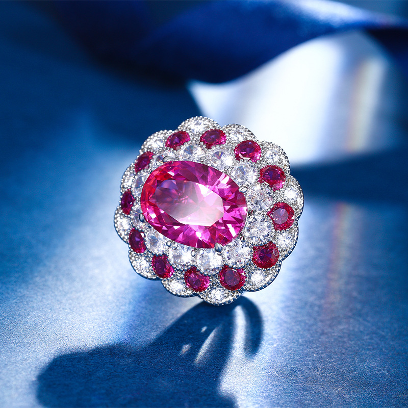 Otoño e invierno Nueva Zhuang Sheng joyas de cobre inferior chapado en oro simulación temperamento corindón rojo traje en forma de huevo 10*14-6*8