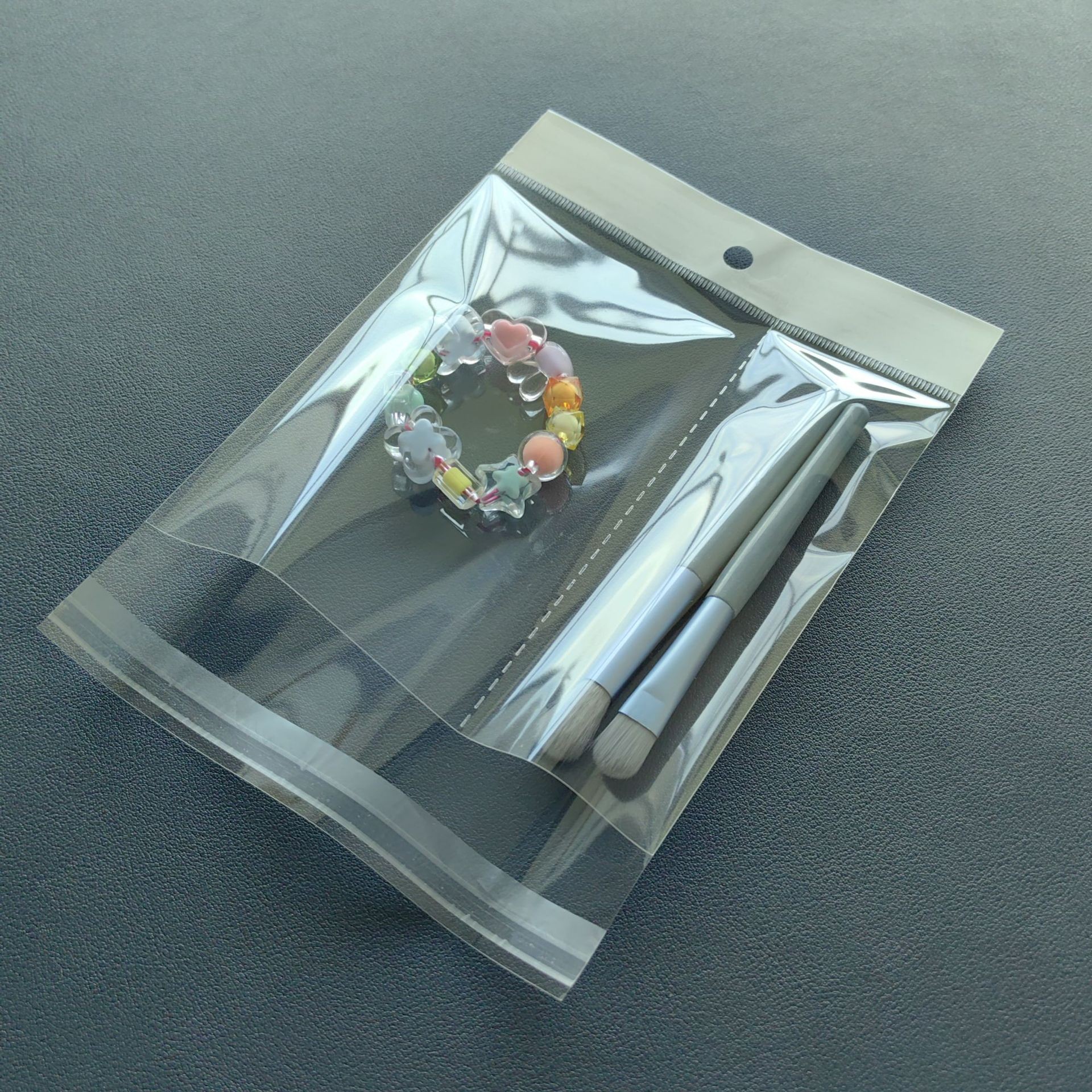 厂家直销OPP卡头挂孔袋多格连体五金餐勺筷子分装自粘透明袋