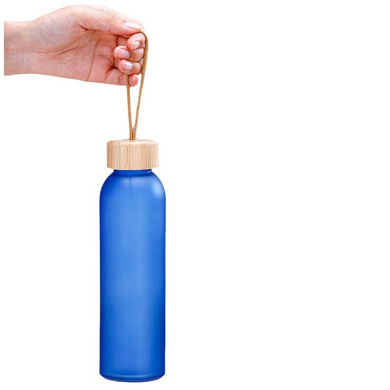 Venta al por mayor de color taza de publicidad de vidrio portátil taza de agua regalo de promoción taza de apertura taza de vidrio transfronterizo