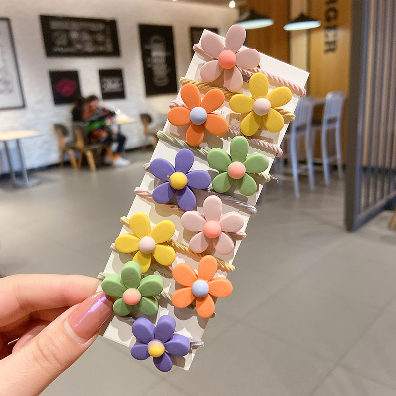 Los niños de la banda del pelo del bebé de la historieta no lastiman la banda de goma del pelo de la niña volumen del pelo menos cuerda del pelo del bebé