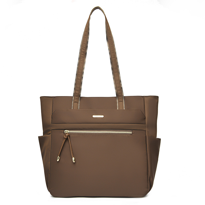 Bolso Tote casual coreano 2025 nueva moda textura de viaje salvaje bolso de mano de un solo hombro suministro directo de fábrica