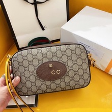 新酷奇双G虎头胸包相机包单肩斜挎包男女同款真皮休闲邮差包复古