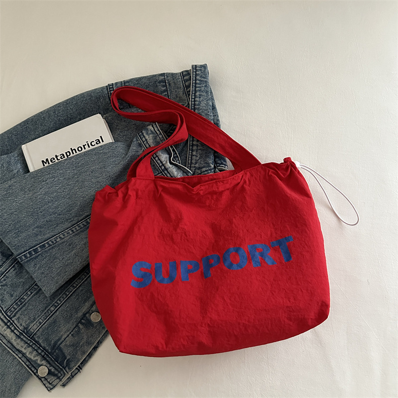 letras coreanas bolsas de lona para mujeres 2024 otoño nuevo relajado bolsas de clase de estudiantes universitarios de gran capacidad bolsas de nylon