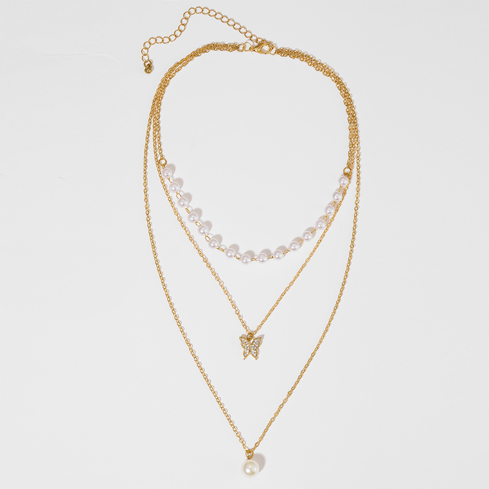 Moda creativa retro simple perla diamante mariposa colgante collar de tres capaspicture2