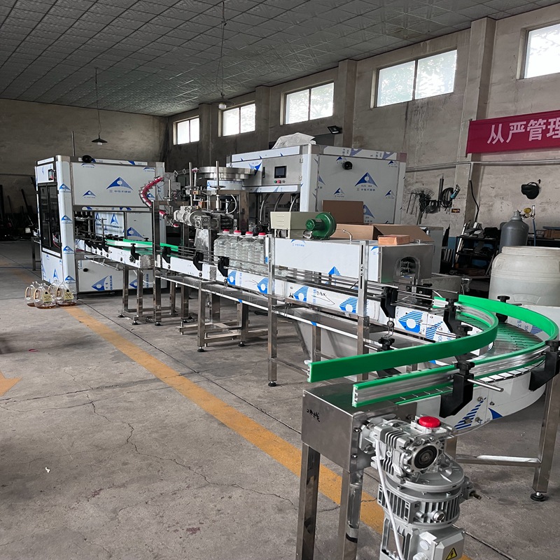 Máquina de llenado de aceite comestible automático de 4 cabezas línea de producción de llenado de aceite de colza de soja equipo de llenado automático de aceite image 3