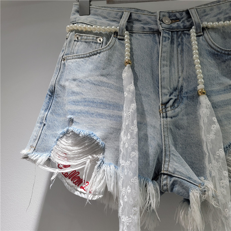 Shorts de Mezclilla con Desgastados y Bolsillos para Mujer image 4