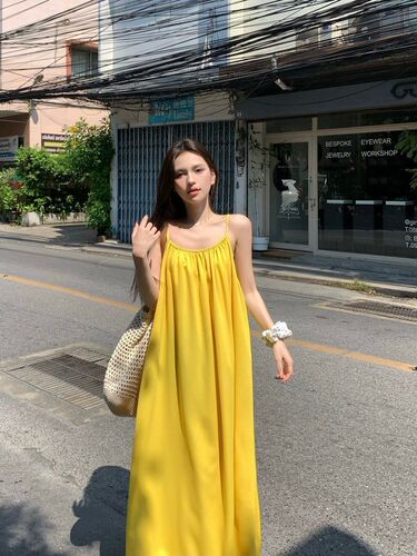 Beach vacation sexy backless suspender dress for women's summer new loose a-line dress gentle yellow long dress