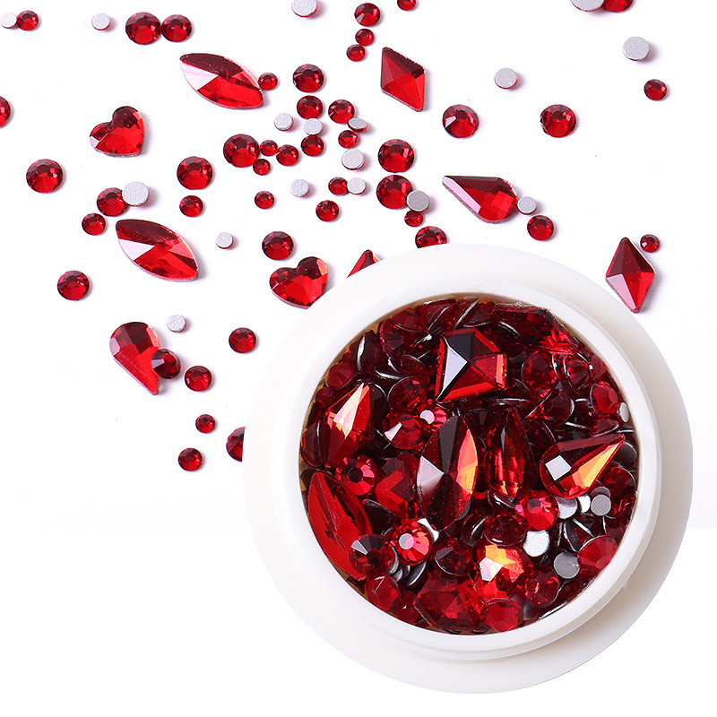 Accesorios de uñas transfronterizos mezclados al por mayor caja redonda de vidrio plano especial en forma de diamante taladro de uñas paquete de material de taladro de uñas al por mayor