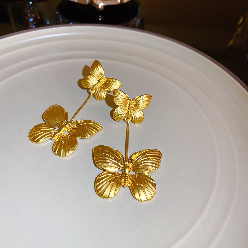 Silver needle butterfly earrings