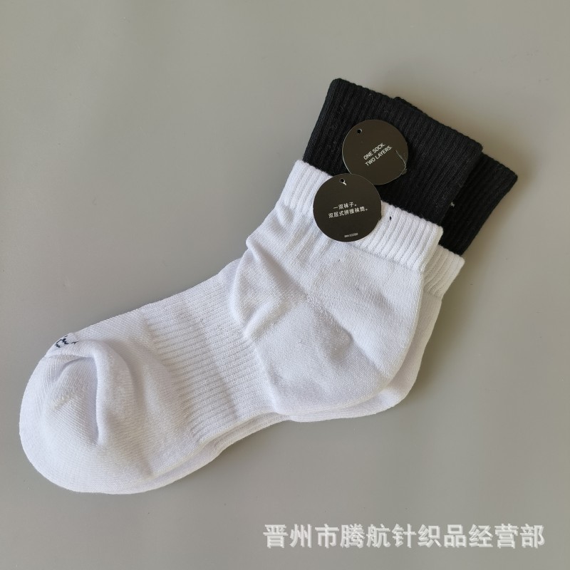 蘇万ナイキの靴下のカラーの二重は男女の中で長い筒のタオルの底のスポーツの靴下をつなぎ合わせてバスケットボールの靴下を走ります。