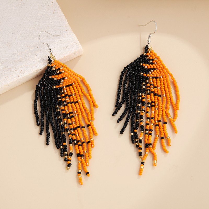 two-color woven ethnic elegant earrings handmade with tassels
