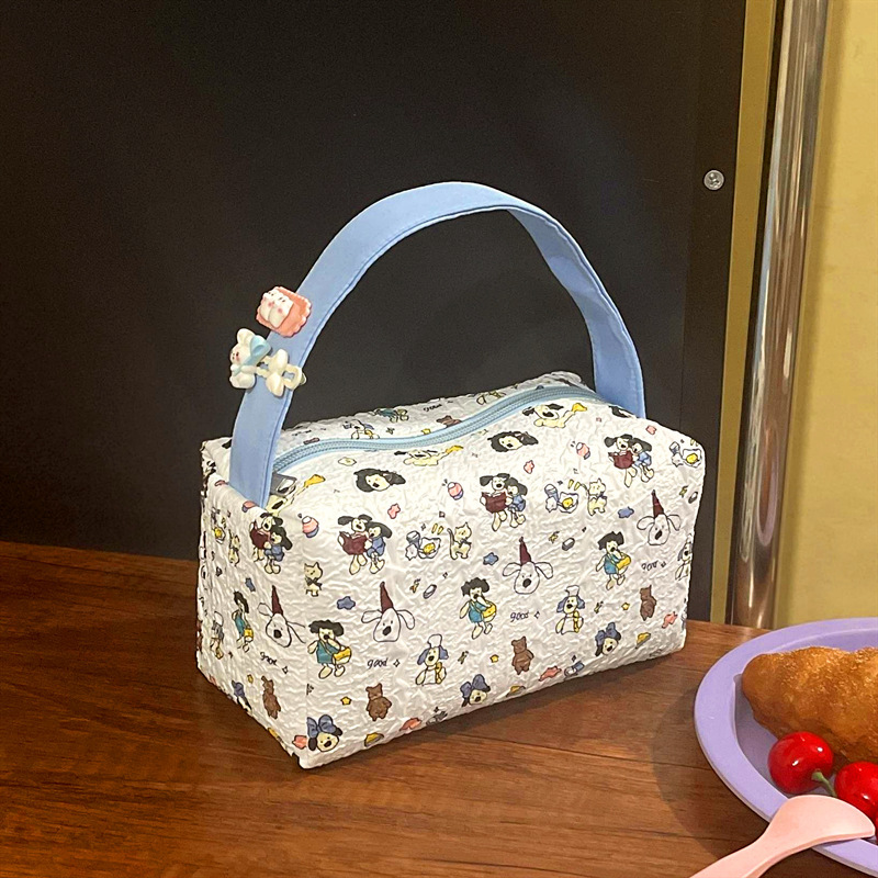 Spring and summer new portable super cute handbag women's large capacity storage bag texture three-dimensional cosmetic bag wash bag