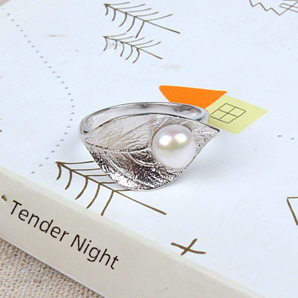 One size fashionable ring from pearl, silver 925 sample