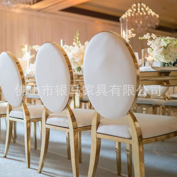 Fábrica al por mayor Hotel banquete boda comedor silla boda galvanoplastia Silla de acero inoxidable Bolsa De Oro suave Silla de comedor de cuero