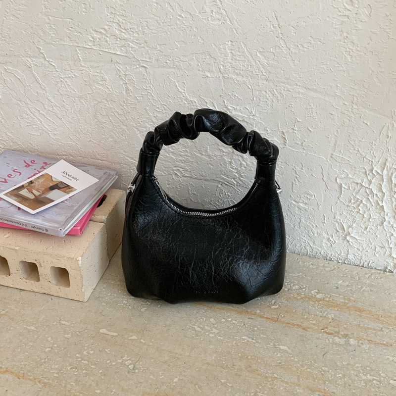 2026 primavera nueva moda temperamento bolso de hombro de moda bolso de arco de moda moda bolso de mano de tendencia diaria plegado mochila