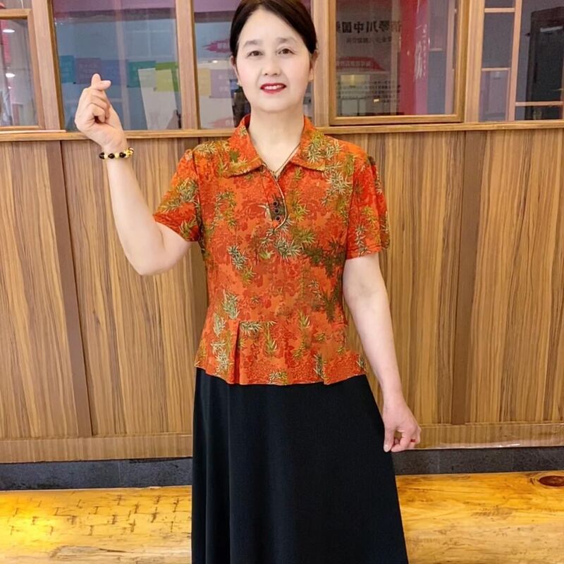 夏の新型のお母さんのファッションの洋気は肉を遮ってやせています。|undefined