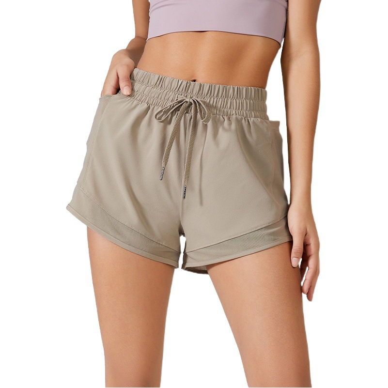 Verano europeo y americano falso pantalones cortos deportivos de dos piezas anti-exposición entrenamiento fitness pantalones cintura alta pantalones sueltos de yoga transpirables