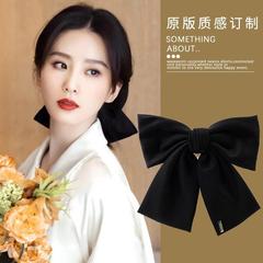 韓国のアクセサリーの東門の髪飾りのスターの同じタイプのヘアピンのスプリングは黒色の大きい蝶結びの頭飾りの後頭部の女性を挟みます。