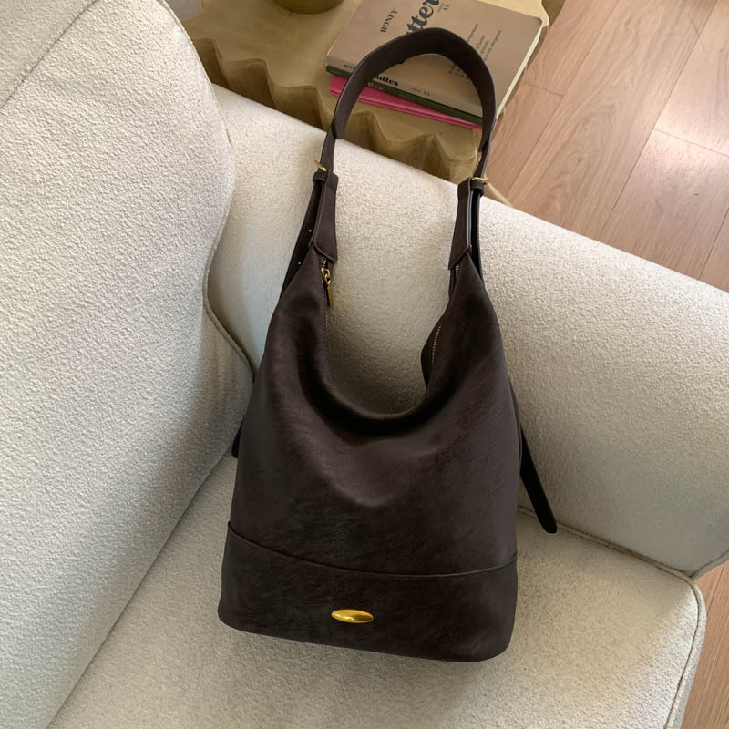 Coreano relajado sensación de colapsar bolso de cubo de seda bolso de mujer 2025 nuevo retro bolso de hombro bolso de viaje