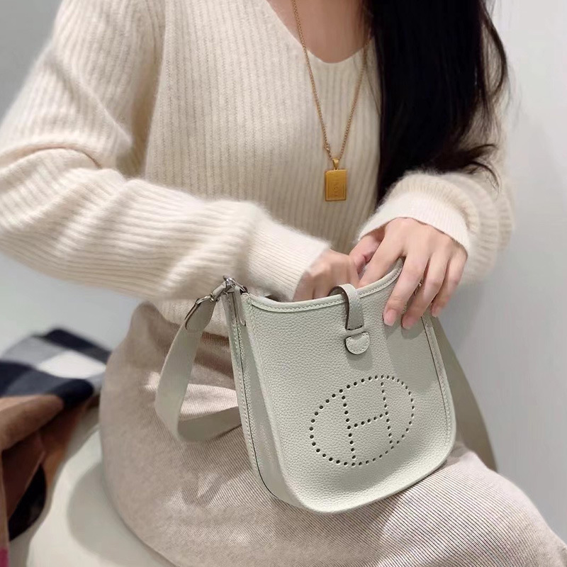 New First-Layer Evelyn Cowhide Genuine Leather Women's Bag 2024 Mini Cut Out Small Bag Fashionable Shoulder Finished Crossbody Bag