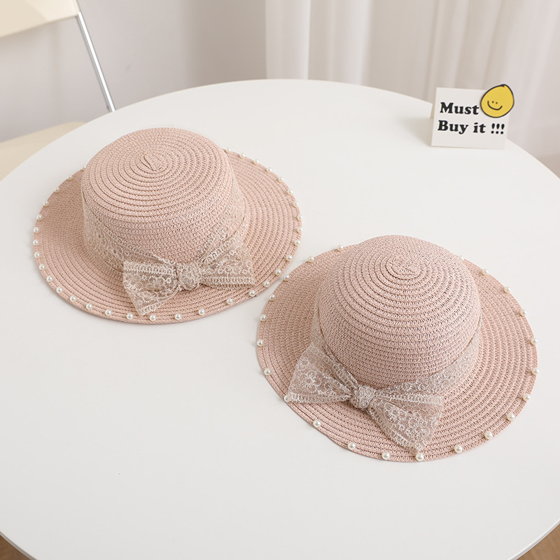 Women's Simple Style Solid Color Bowknot Wide Eaves Straw Hat display picture 7