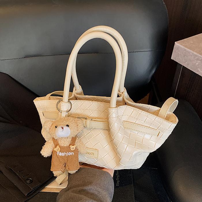 Bolso de cubo de estilo explosivo de moda para mujer 2025 nuevo bolso de hombro de nicho de todo fósforo tejido de estilo occidental bolso de mensajero de mano de moda