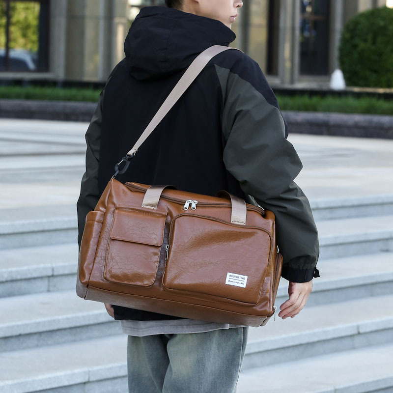 Nueva bolsa de viaje PU retro de gran capacidad portátil de viaje de hombres bolsa de ocio bolsa de gimnasio