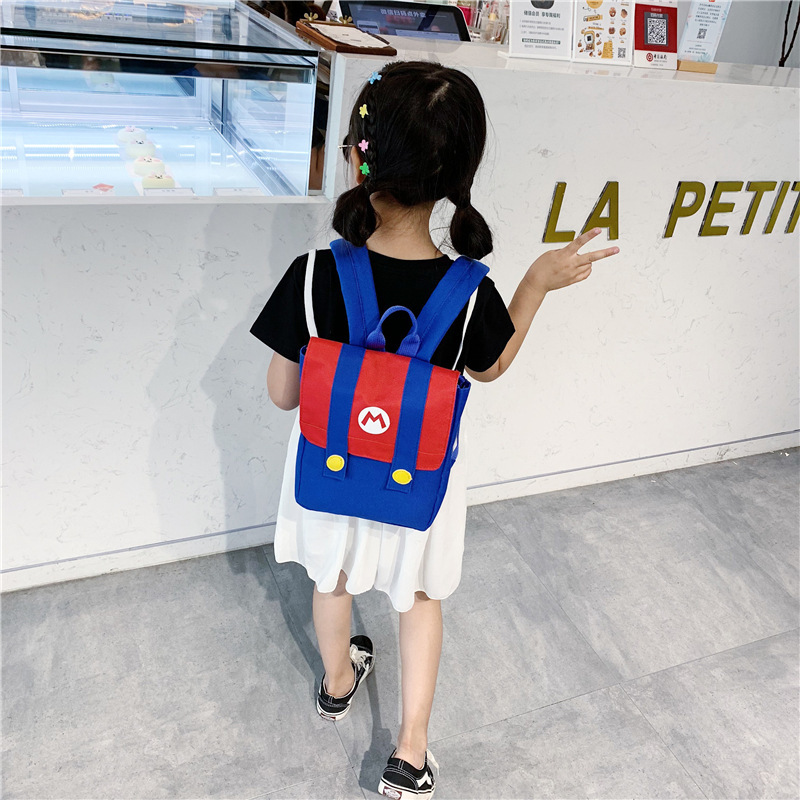 Nueva mochila infantil de estilo coreano con letras de dibujos animados impresas con LOGO, mochila para niños y niñas, mochila escolar de colores contrastantes para jardín de infantes