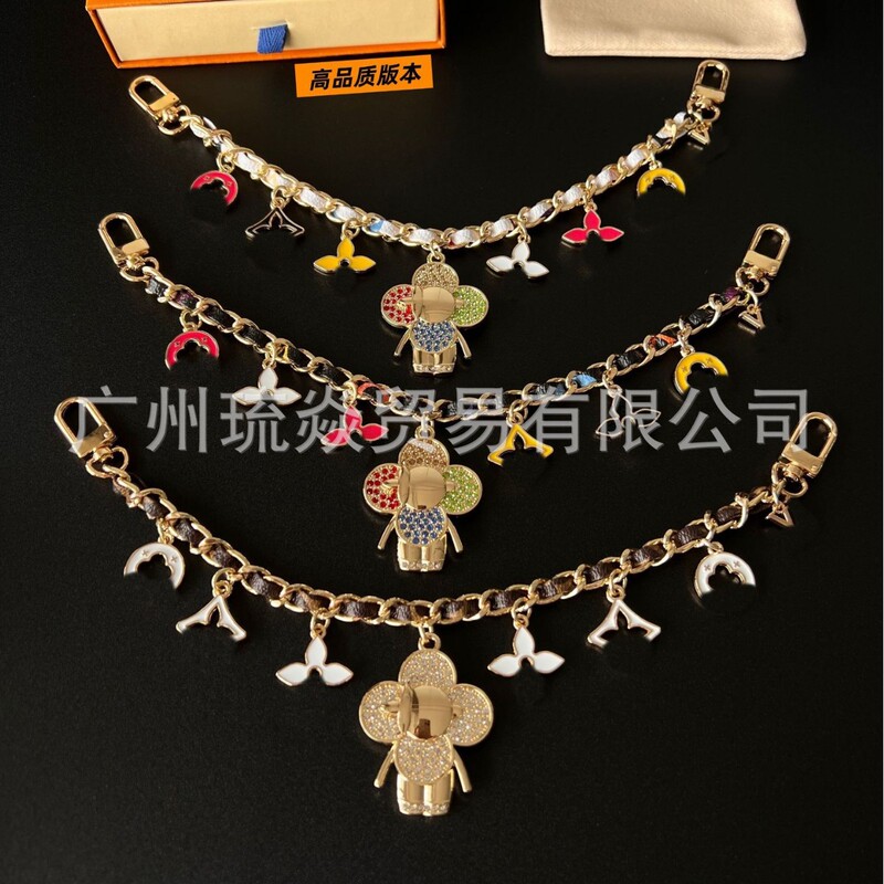 Fashionable colorful pendant doll bag accessory with vintage leather strap and decorative chain, suitable for handbags Fashionable colorful pendant doll bag accessory with vintage leather strap and decorative chain, suitable for handbags