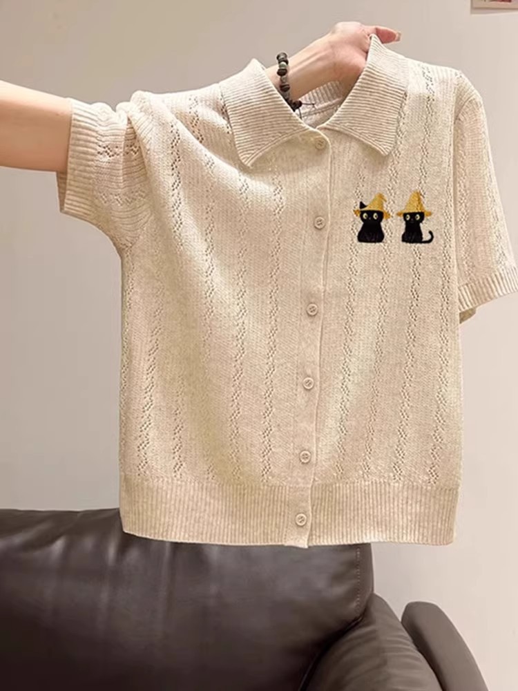 Áo polo nữ tay ngắn cổ bẻ thêu họa tiết form rộng — Màu yến mạch