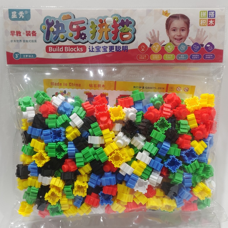 Bloque de copo de nieve de jardín de infancia al por mayor transfronterizo montaje puesto de juguete de escritorio a granel rompecabezas tubo de rueda