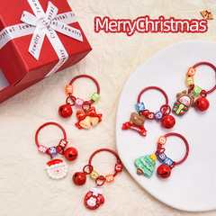 クリスマススタイルの祝日のキーホルダーのリボンのプレゼントの箱のキーホルダーのカラーの鈴のアクセサリーは卸売りを飾ります。
