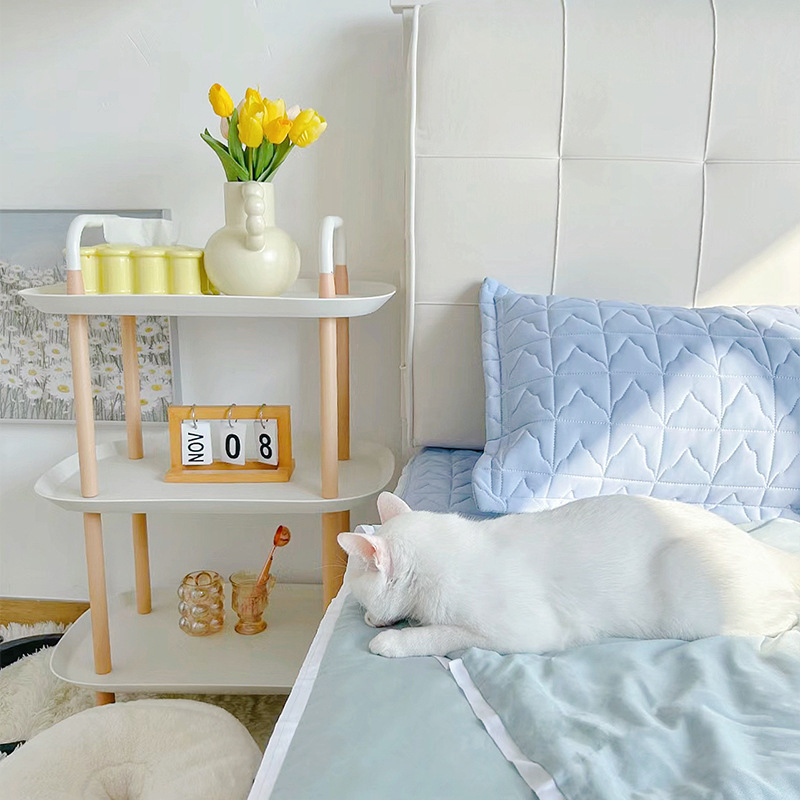 Estante de carro de cabecera de viento crema Estante de almacenamiento de bocadillos multicapa con ruedas para el hogar simple Estante de almacenamiento de teléfonos móviles