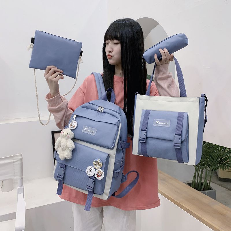 New Korean version with stylish large capacity Oxford cloth multi-purpose four piece backpack for primary, secondary,_voghion.com