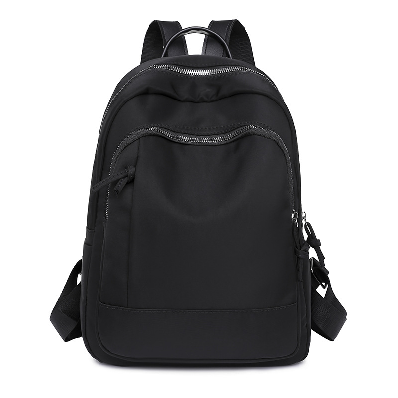 Fuente de origen 2023 nueva mochila Oxford para mujer coreana, mochila de viaje al aire libre de moda simple y versátil