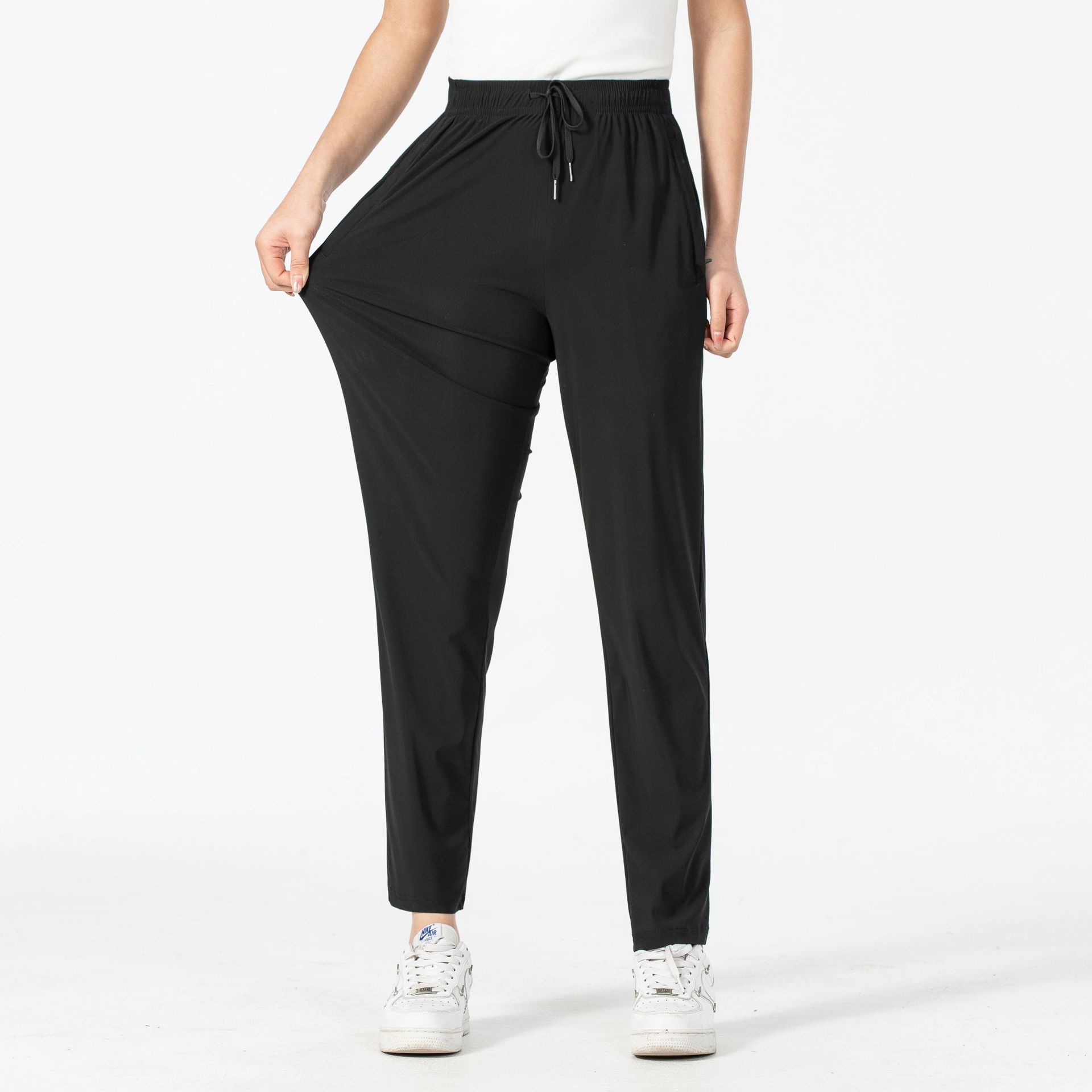 Pantalones de seda de hielo para hombres y mujeres de verano delgados secado rápido transpirable paquete deportivo pie pareja pantalones casuales de seda suave pantalones largos