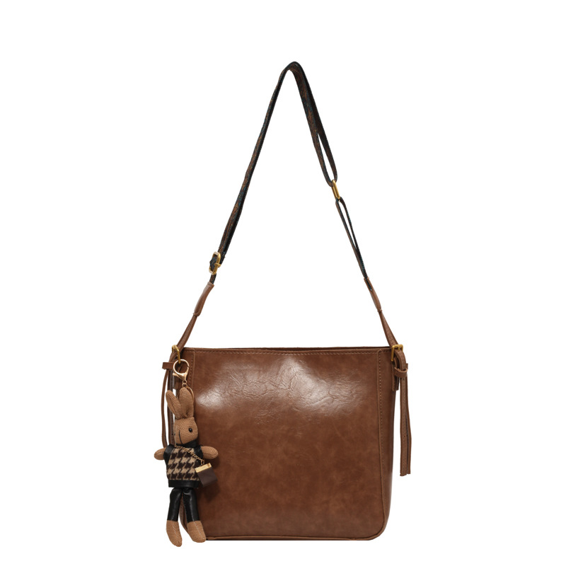 Bolsa casual simple para mujeres 2025 nuevo bolso de cubo universal estilo extranjero de alta calidad bolso de hombro