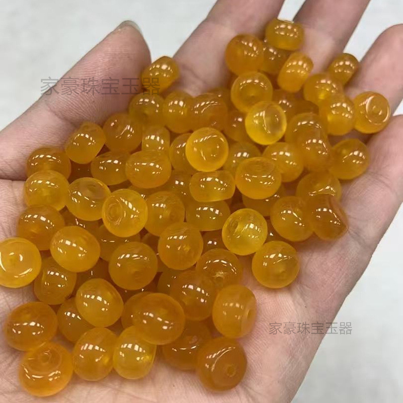 氷の底に青い花が漂っています。10mmのそろばんのビーズは卸売りします。|undefined