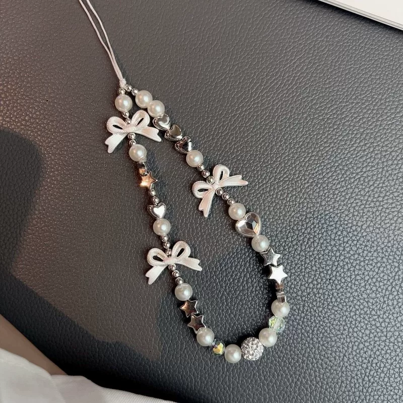 Phone strap beaded keychain, pearl‑bow charm, universal bag/camera accessory, gift‑ready