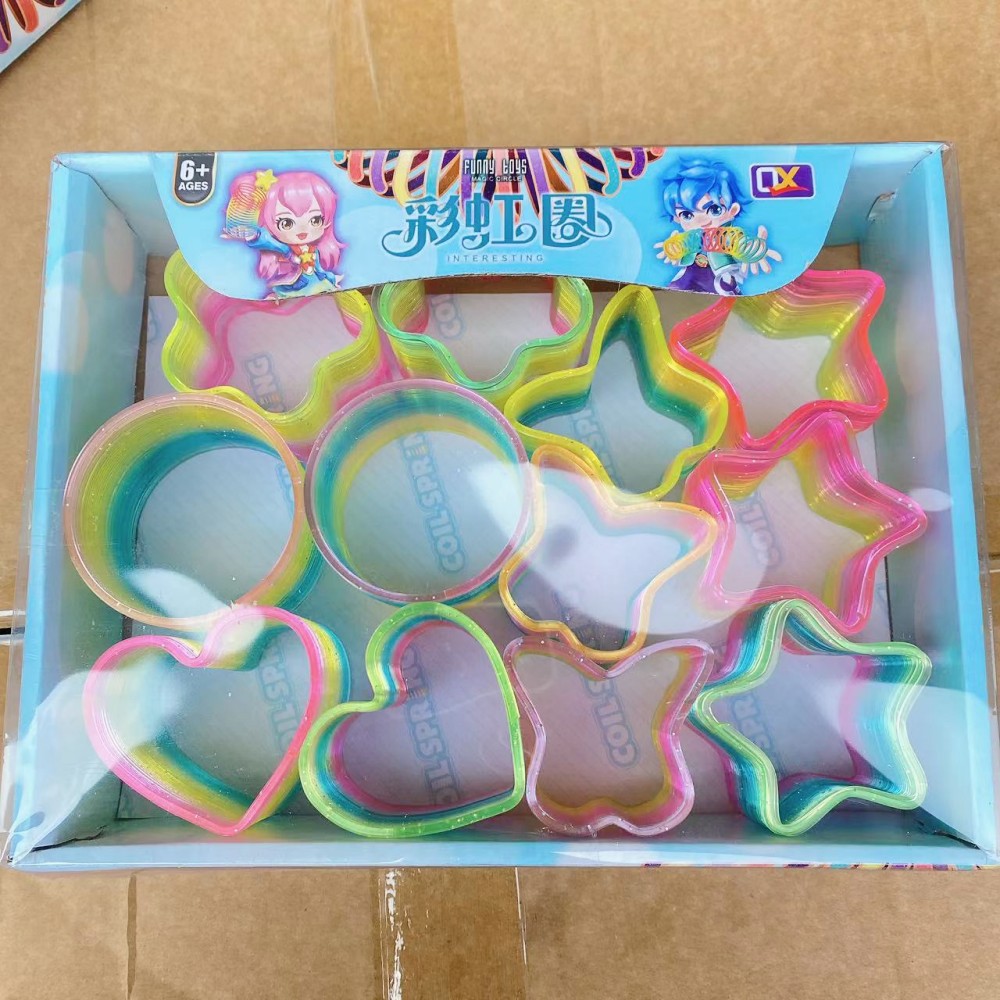 Juguete para niños anillo de arco iris elástico al por mayor primavera educativa anillo apilado gran cristal mezclado descompresión del cabello tienda departamental