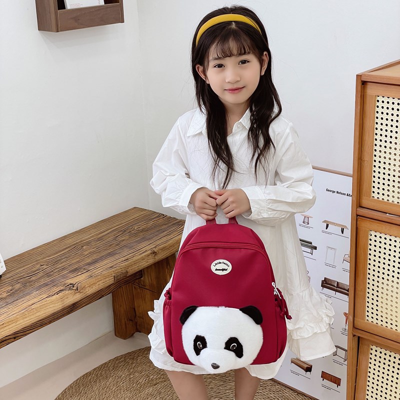 Escuela de jardín de infantes escuela primaria mochila de dibujos animados lindo panda macho y hembra mochila 2025 nueva moda de mochila para niños