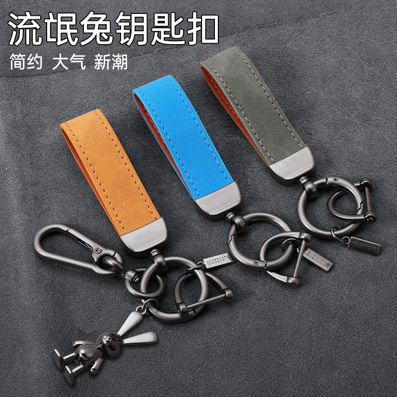 Popular de alta gama llavero de coche conejo colgante pareja llavero de negocios llavero coche especial herradura hebilla