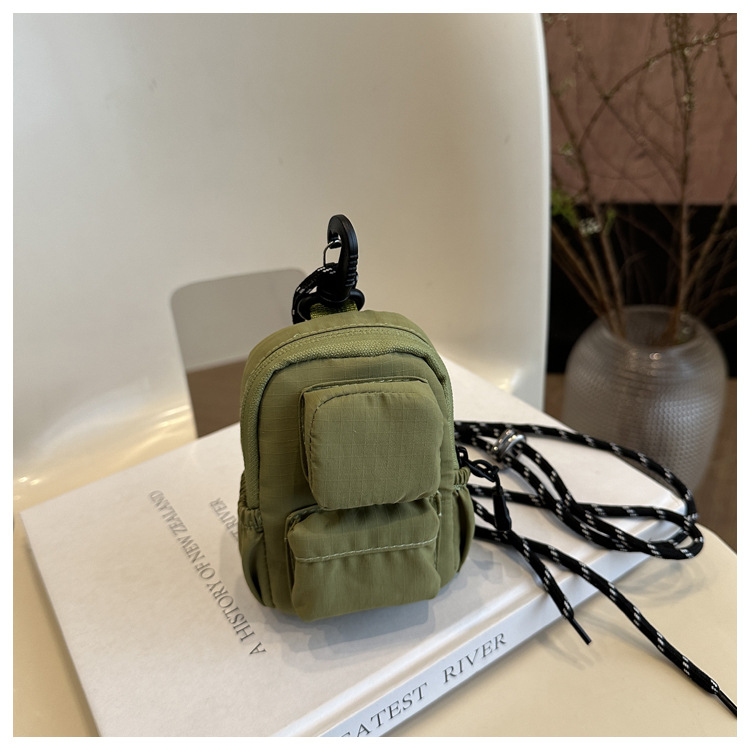 Mini colgante bolso de cambio 2025 nuevo cross-border nylon impermeable bolso de auriculares de bolsillo de hombro