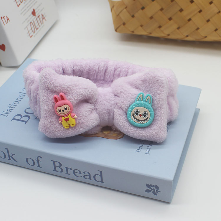 Nuevos dibujos animados tela de tela correa de pelo al por mayor extraña peluche lavado facial maquillaje de tela de tela de tela de banda de mariposa final de cabello de chicas