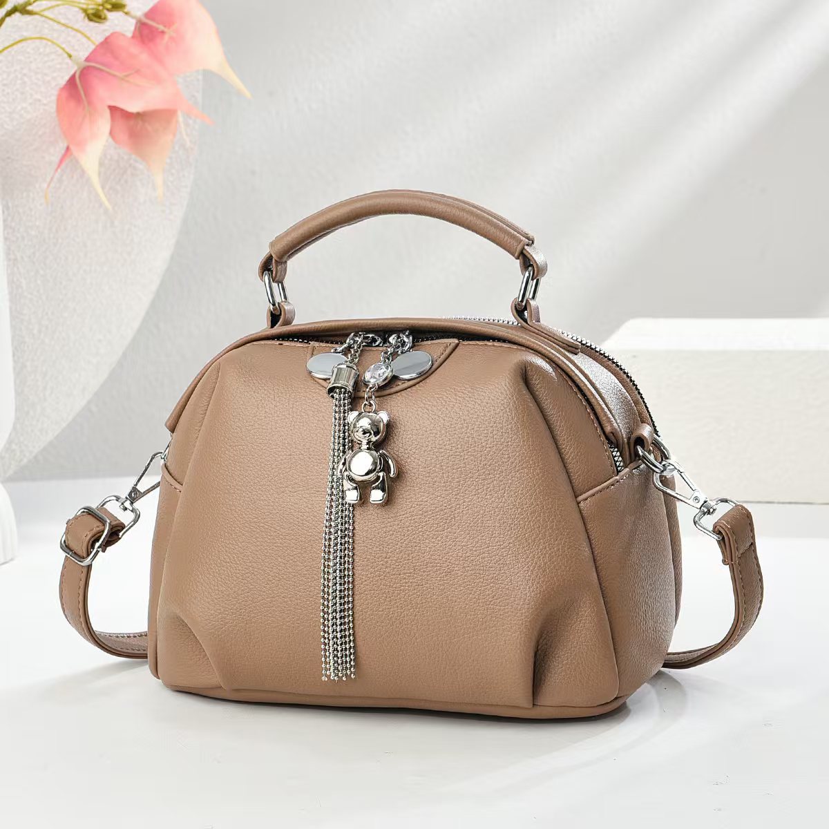 Patrón de lichi de cuero suave de moda salvaje 2025 nuevo bolso de viajero bolso de hombro de gran capacidad retro de verano