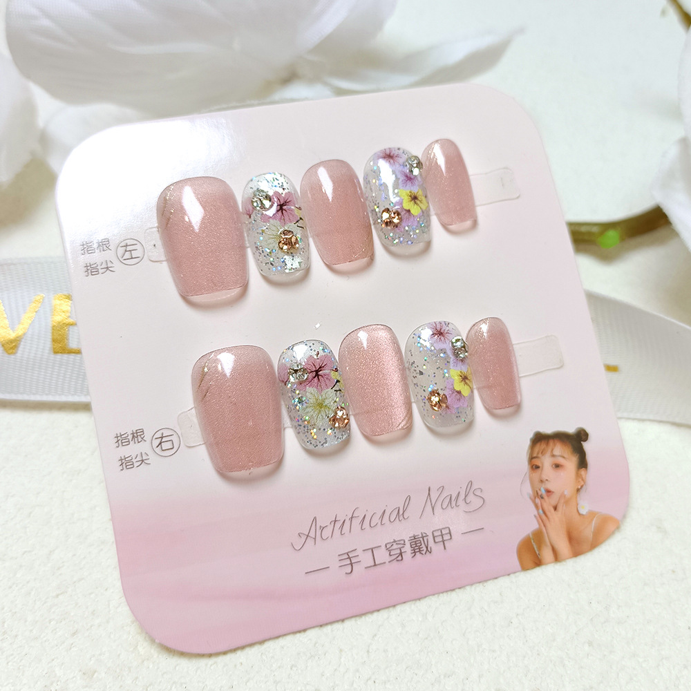 Douyin estilo caliente flor seca ojo de gato uñas parche de uñas sentido avanzado 10 piezas de código dividido armadura portátil hecha a mano corta hecha a mano