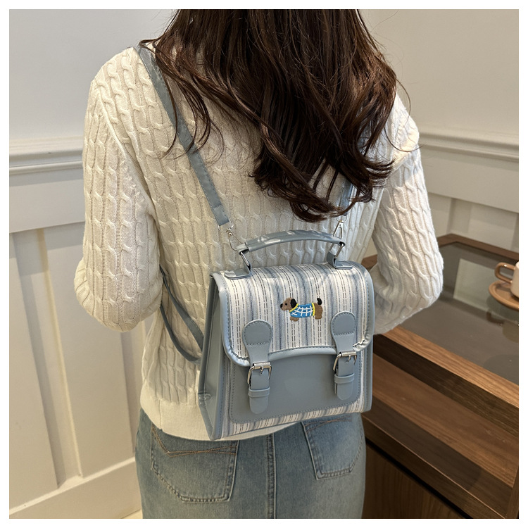 The new backpack for the autumn of 2024 is a fashionable and simple hand-held student single-shoulder bag with a checkered lid and a retro crossbody style undefined