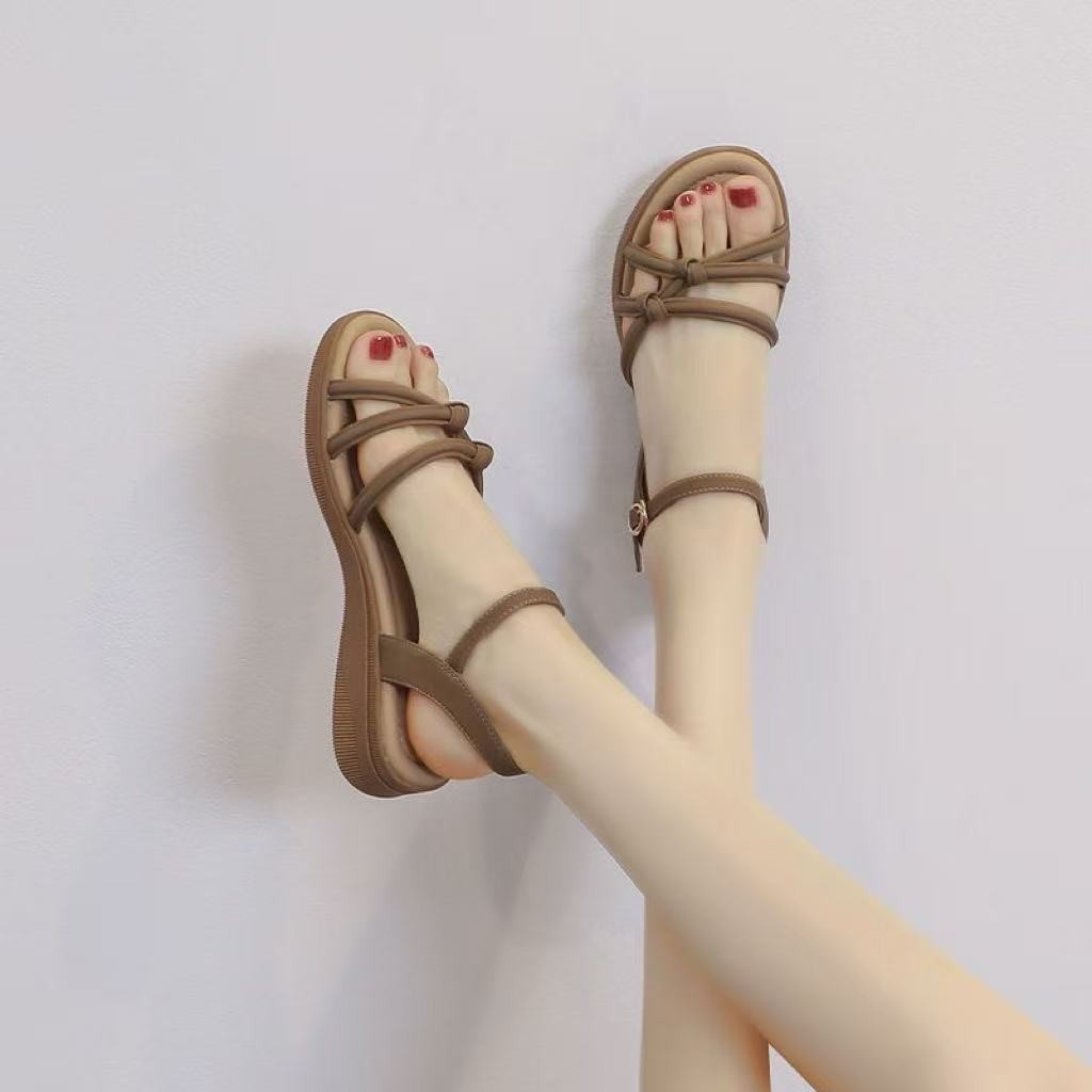 2026 verano nuevo estilo de moda casual sandalias romanas de suela suave para mujeres hebilla de talón grueso sandalias de suela plana